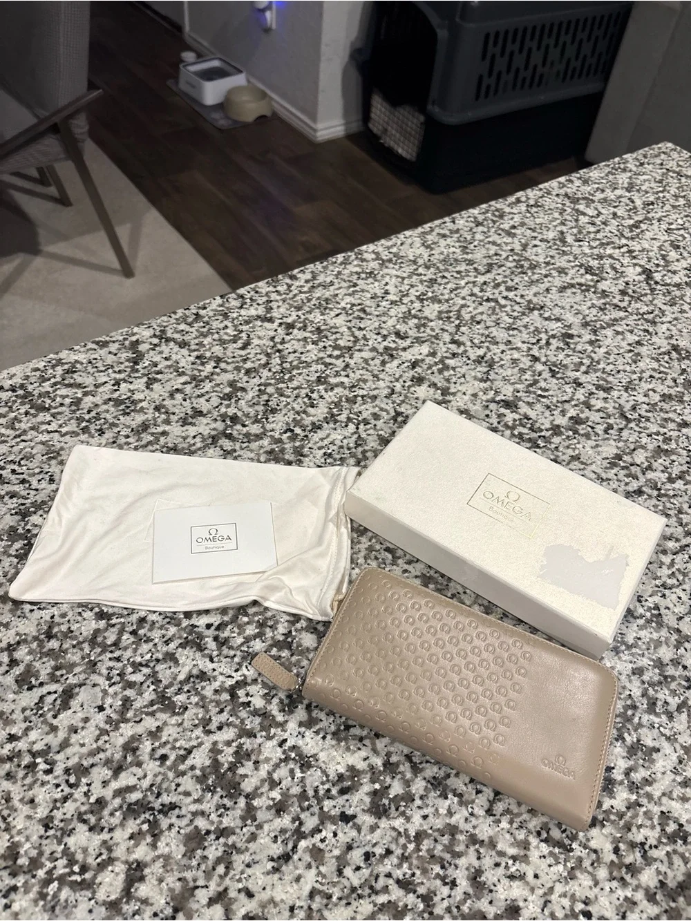 Omega boutique monogrammed